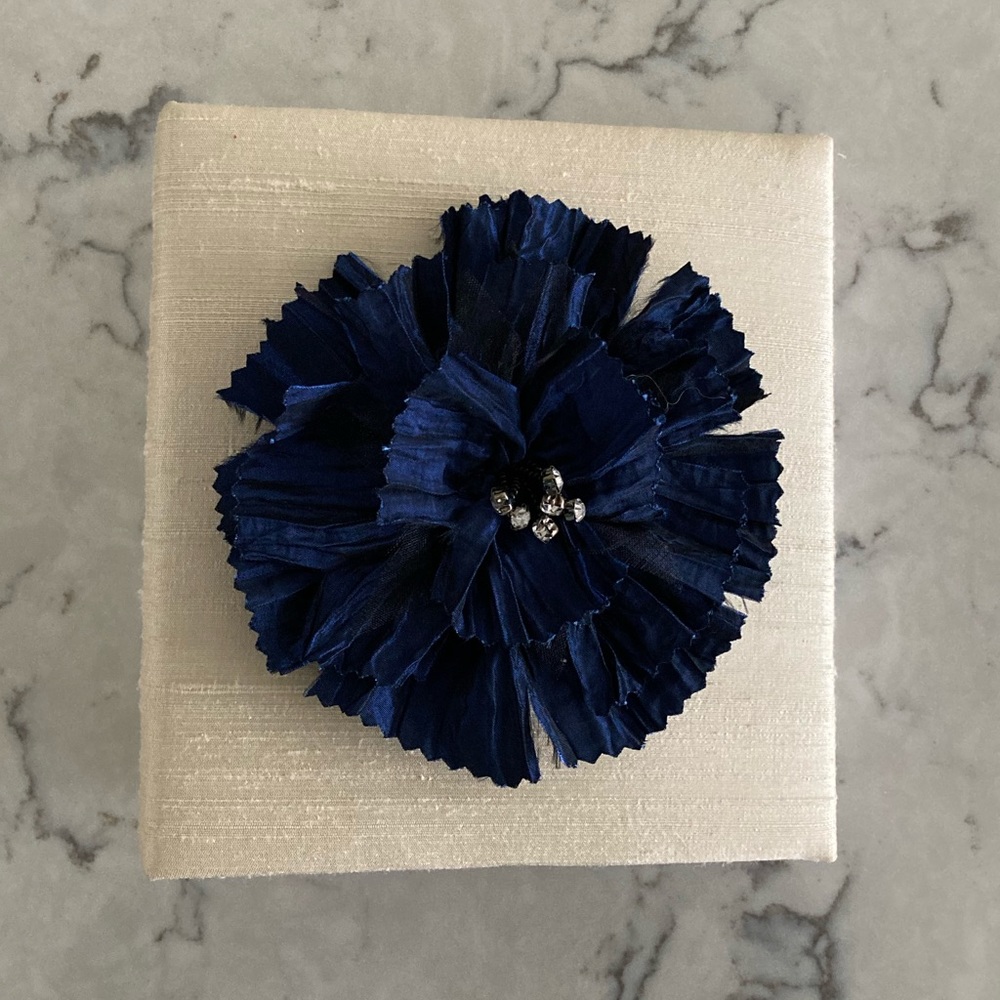 Ivory and navy photo album with satin flower